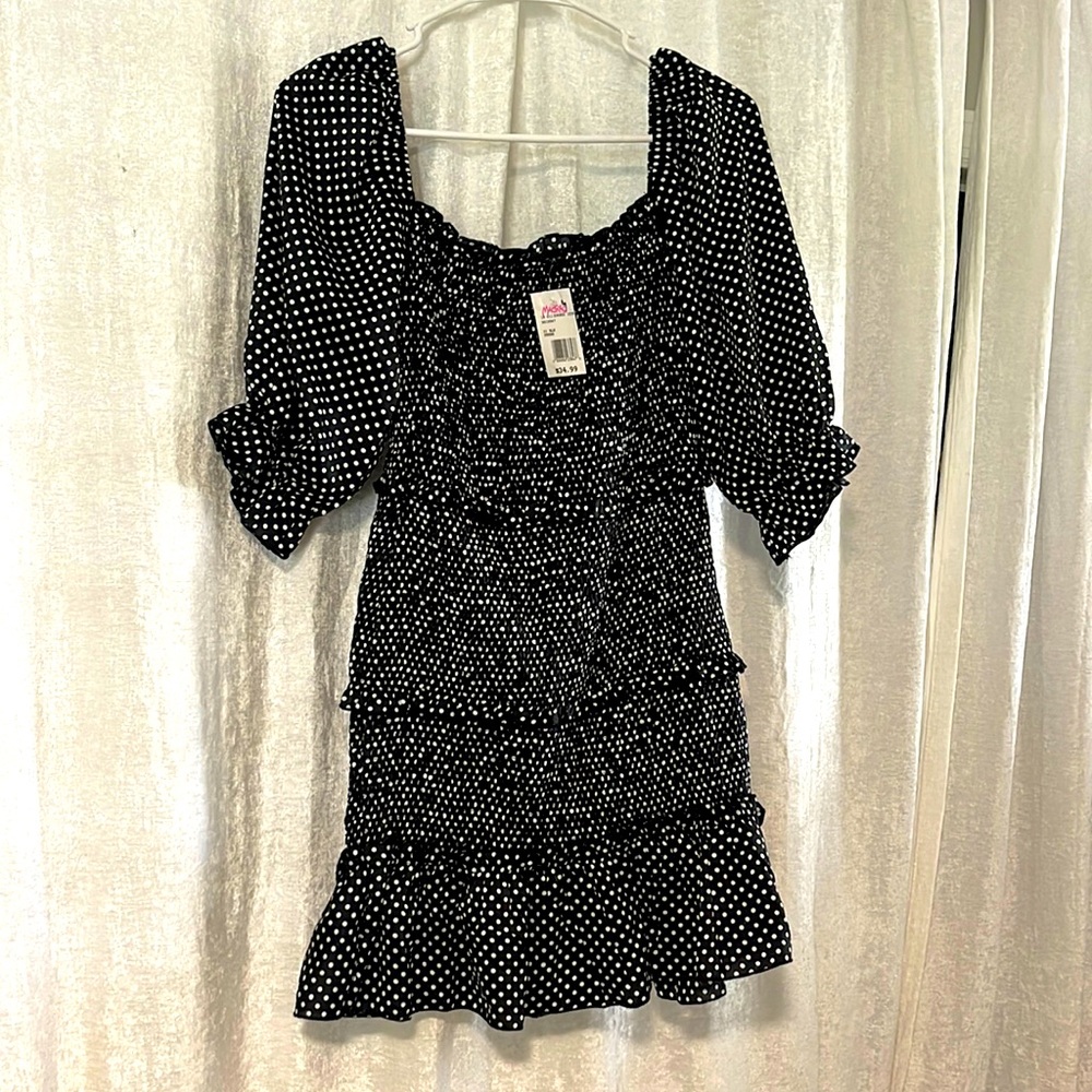NWT. Polka dot mini dress with puffy sleeves. Black and white, size Small.